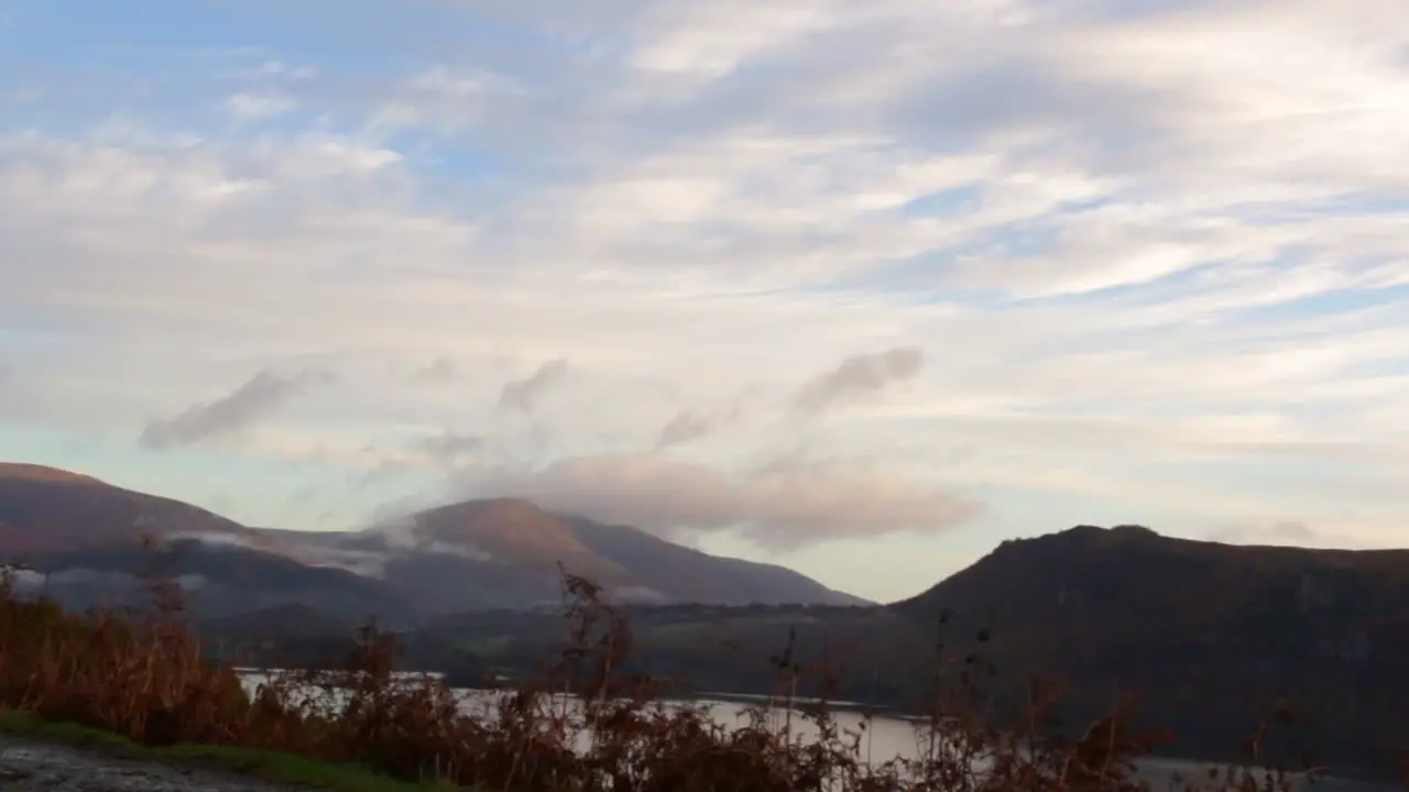 Clouds flowing over mountains in real time in the Lake District National Park Cumbria United Kingdom