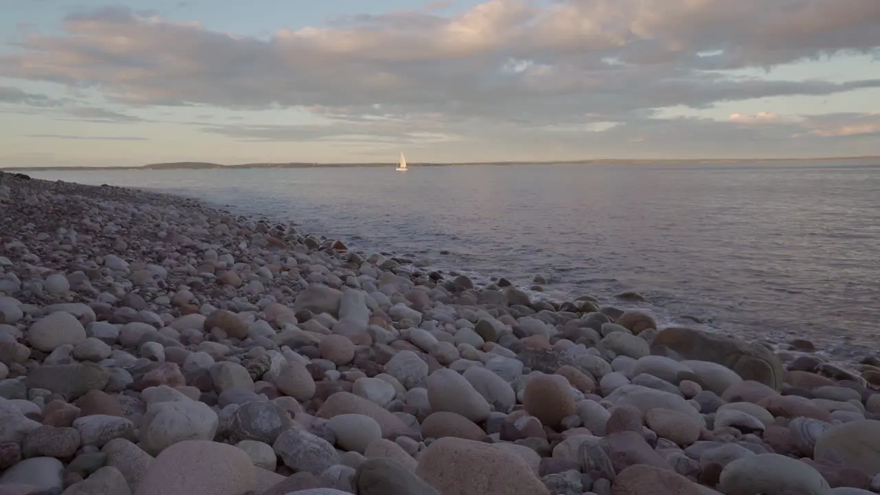 Relaxing video of rocky beach at sunset time