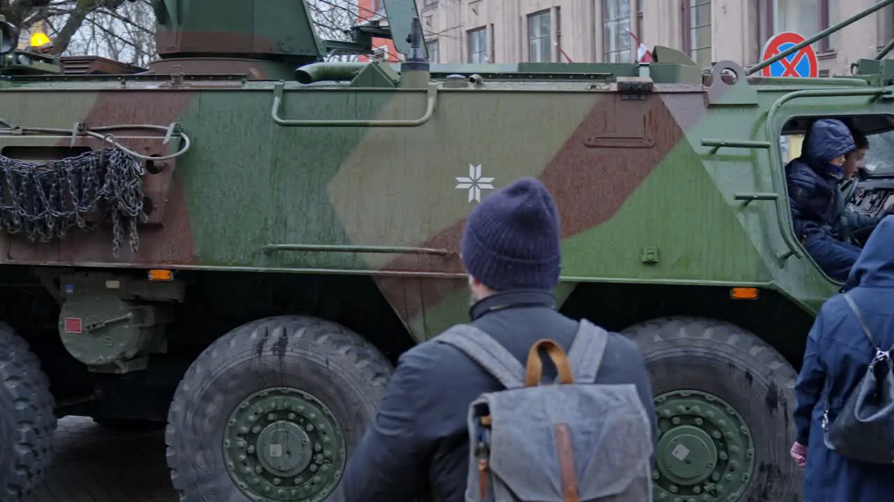 Armored Military Vehicle Draws Public Attention on City Streets