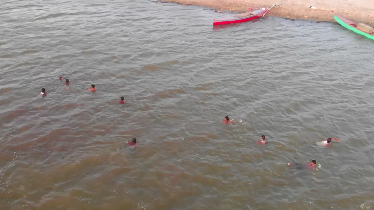 Aerial Overhead View Of Male Rescuers Swimming For Flood Rescue Training In Balochistan