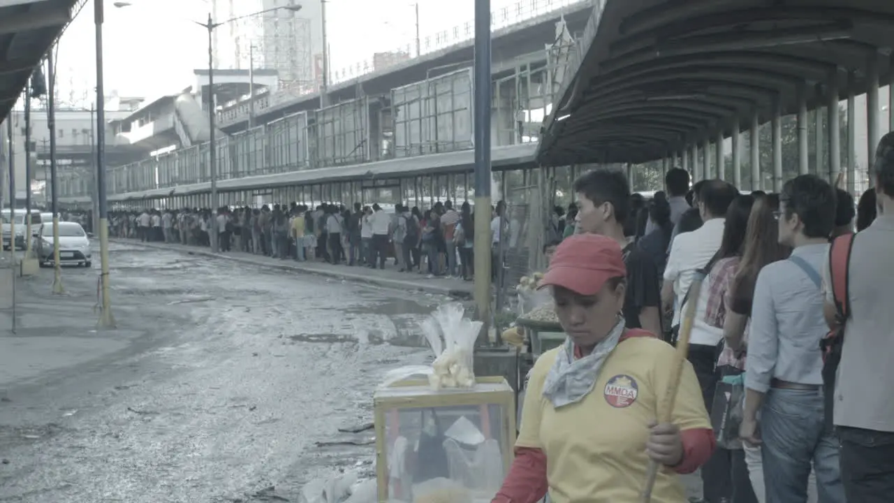 Long Queue of Manila MRT Passengers