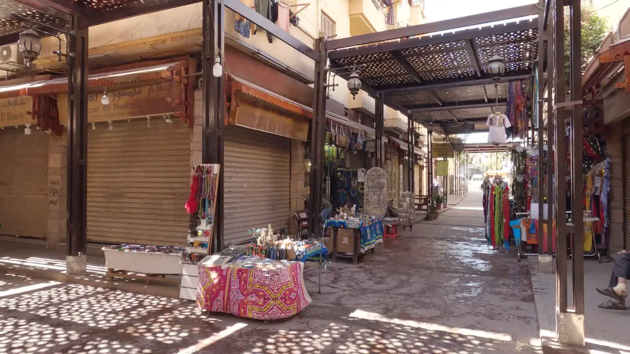 Street market at noon without many people in a neighborhood in Luxor Egypt