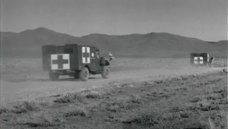 1950s Vehicles Driving to Test Site During American Nuclear Exercise