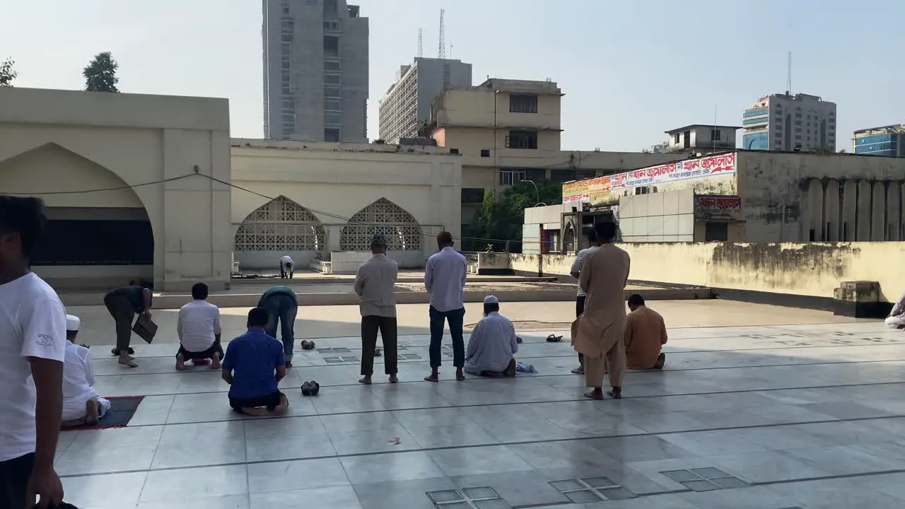 Muslim Males Praying In Courtyard Of Baitul Mukarram National Mosque In Dhaka