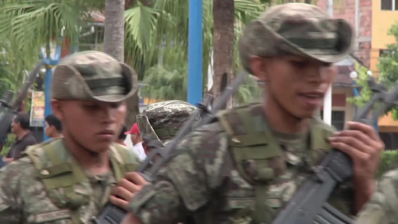 Army Soldiers Marching Past In Formation On Street In Peru