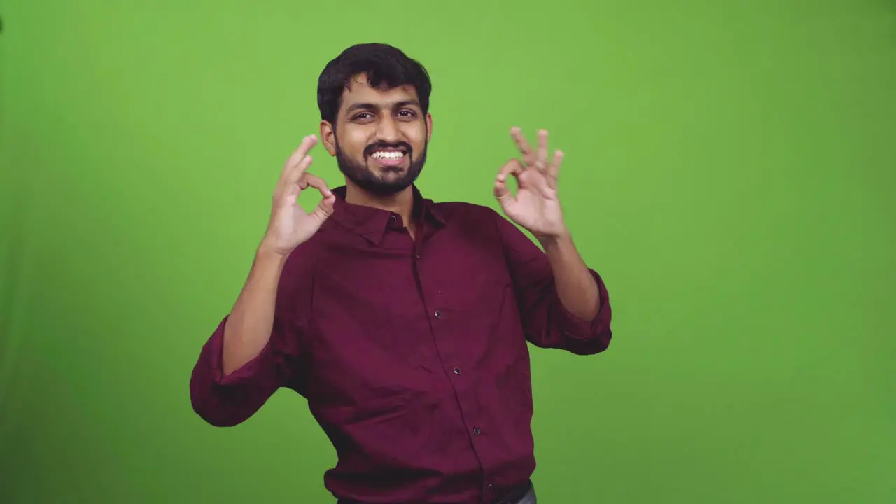 Attractive person showing global everything in perfect gesture isolated on green screen