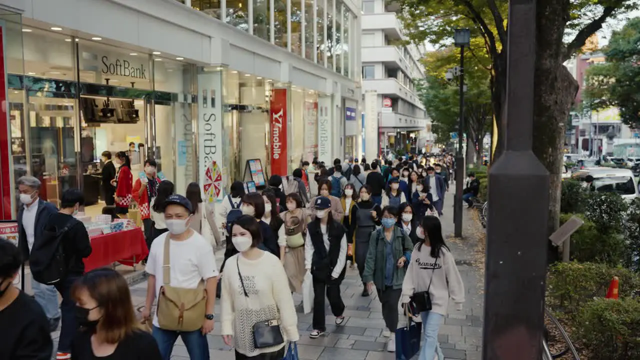 Busy Shopping Street in Tokyo's Harajuku District on Weekday