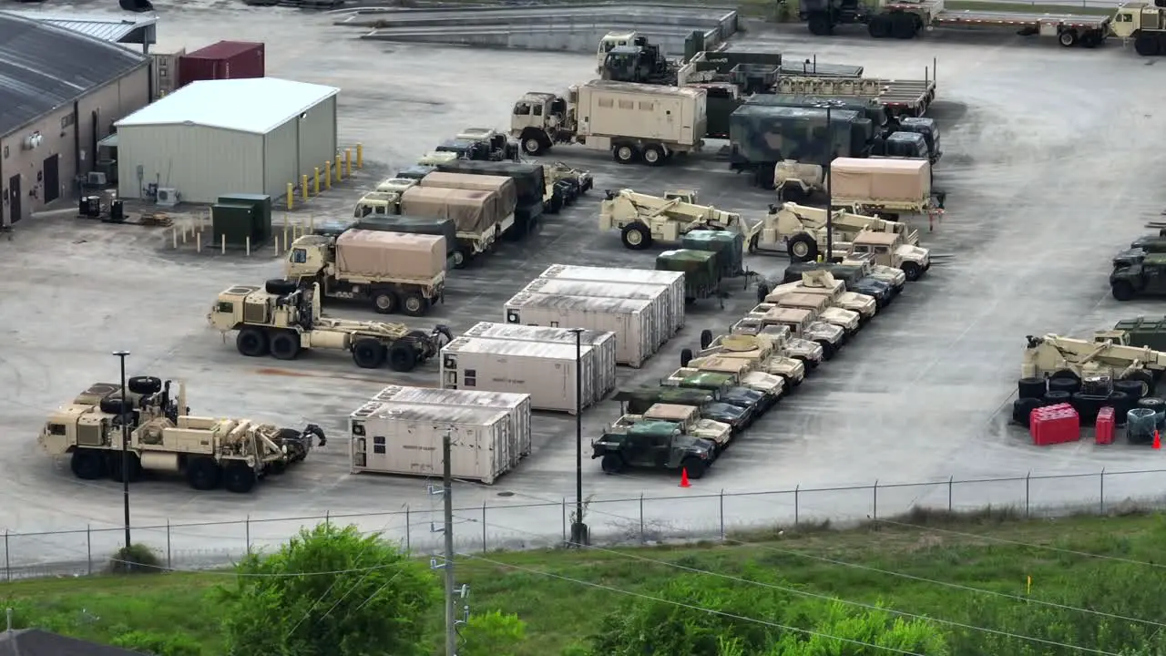 USA Army Depot with trucks and Humvee equipment storage ready for war