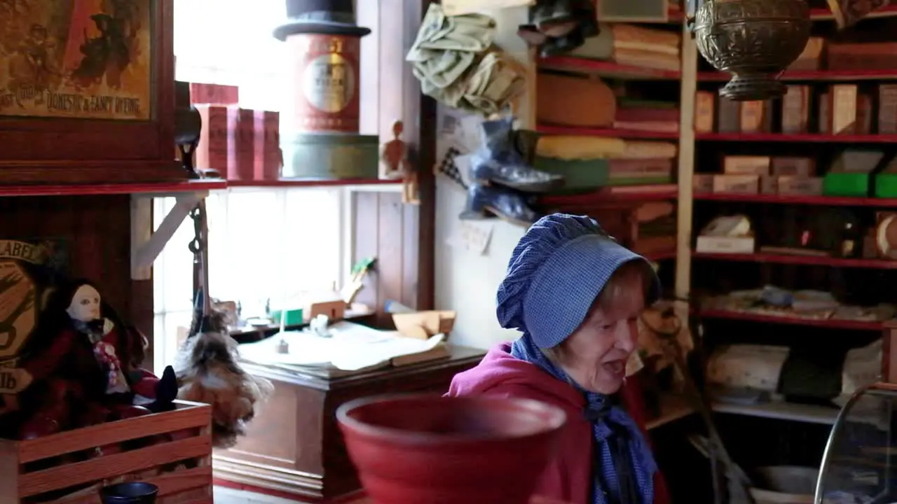 Victorian woman in a shop in a historical reconstruction