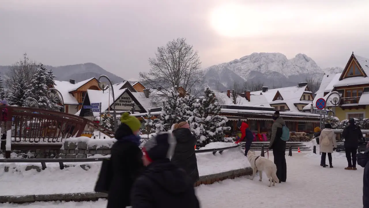 People gathered at a square in famous winter ski resort town of Zakopane Poland