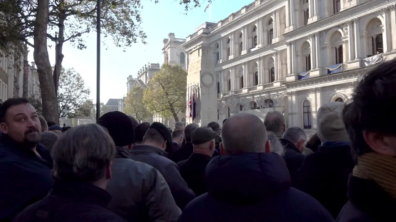 People gather to pay their respects at the Cenotaph on Armistice Day in London UK