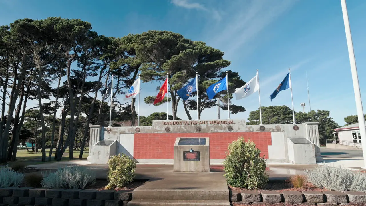 Military Flags Waving At The Bandon Veterans Memorial In The City Park Of Bandon In Oregon