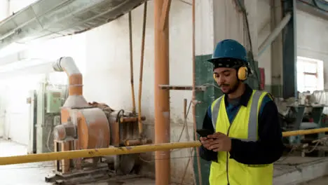 Man walking in a marble factory