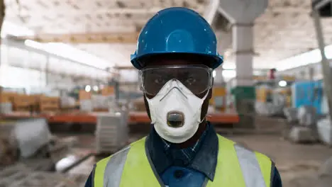 Man wearing protective gear in factory