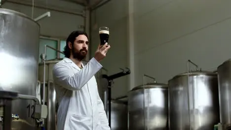 Man tasting beer at brewery