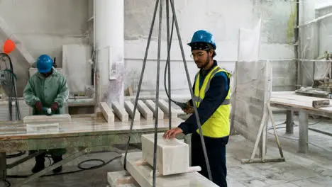 People working with marble