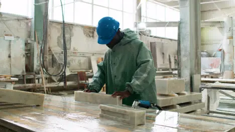 Man polishing marble