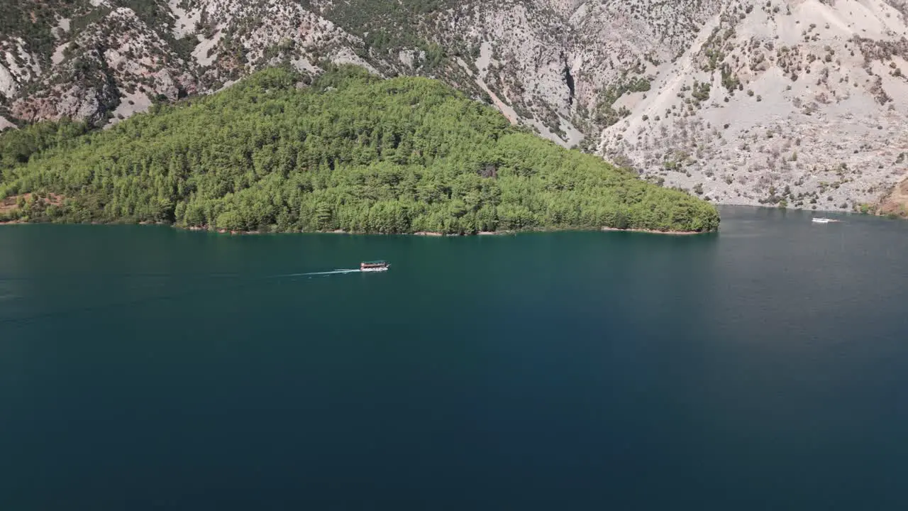 Idyllic View Of A Boat Sailing Across Green Canyon Of Oymapinar Dam Reservoir In Antalya Province Turkey