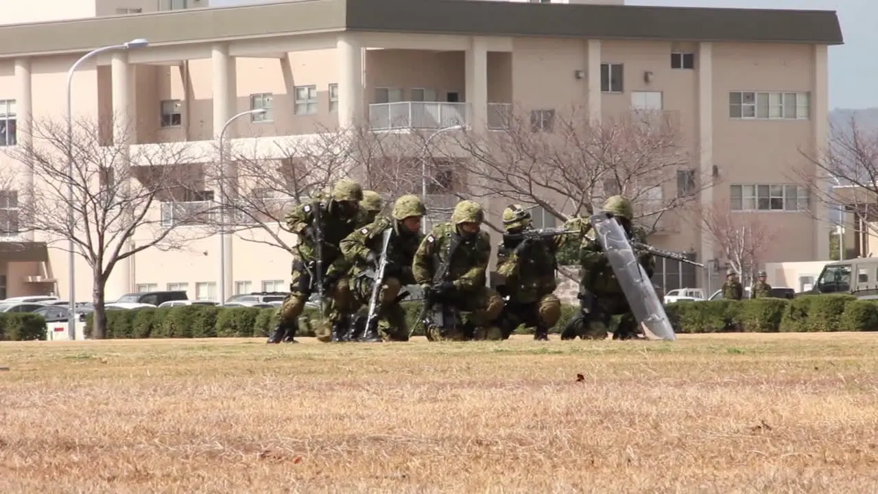 A Marine Swat Team Performs A Simulated Hostage Rescue Mission