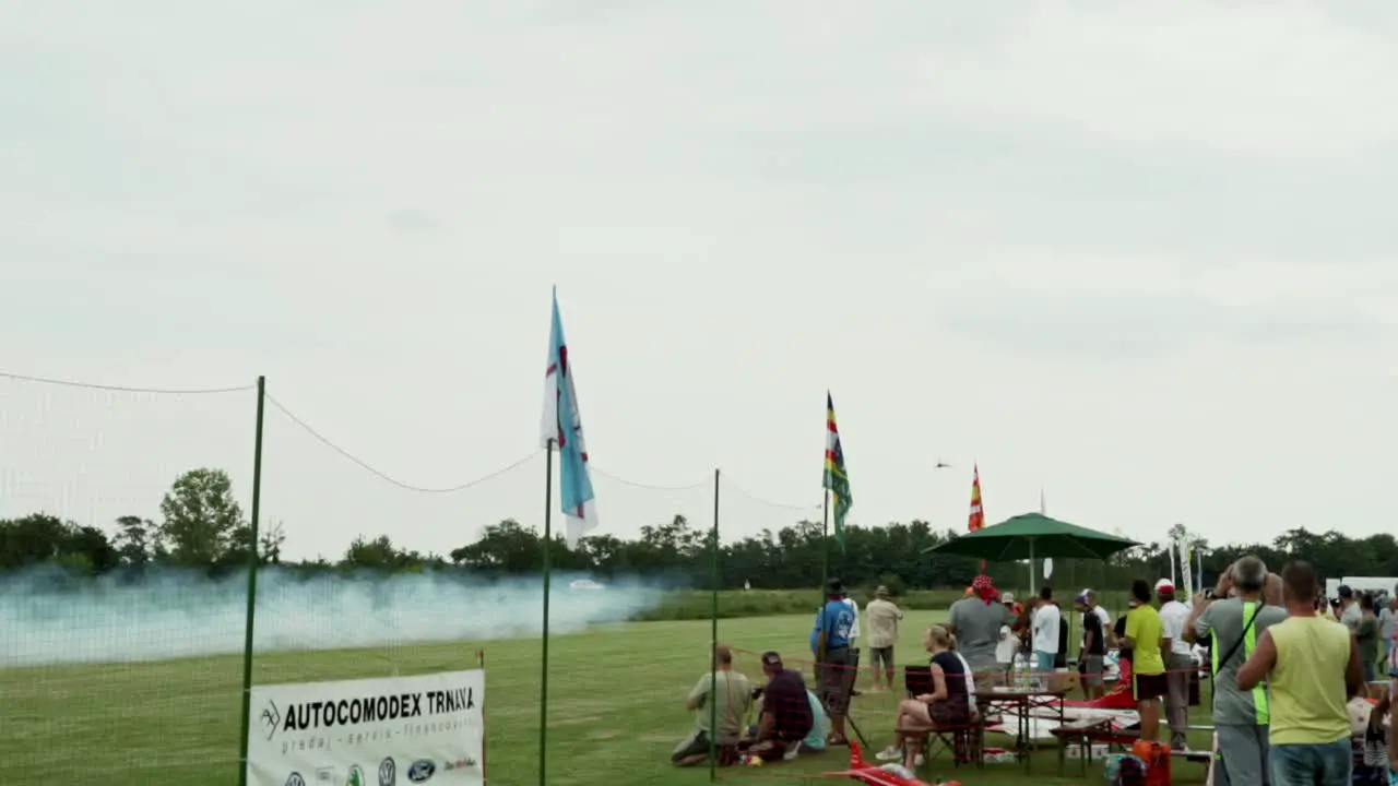 Radio controlled model jet is taking low flight over the runway