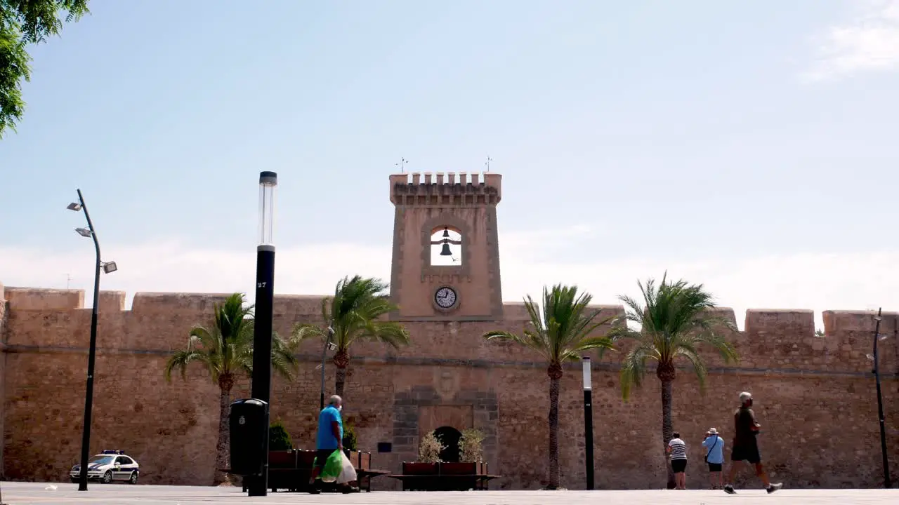 Locked shot of masked people in Santa Pola Spain