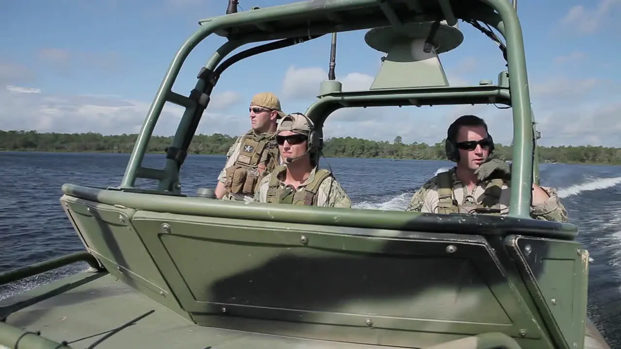 Us Navy Strike Force With South American Soldiers In A Riverine Maneuver In A Jungle Environment