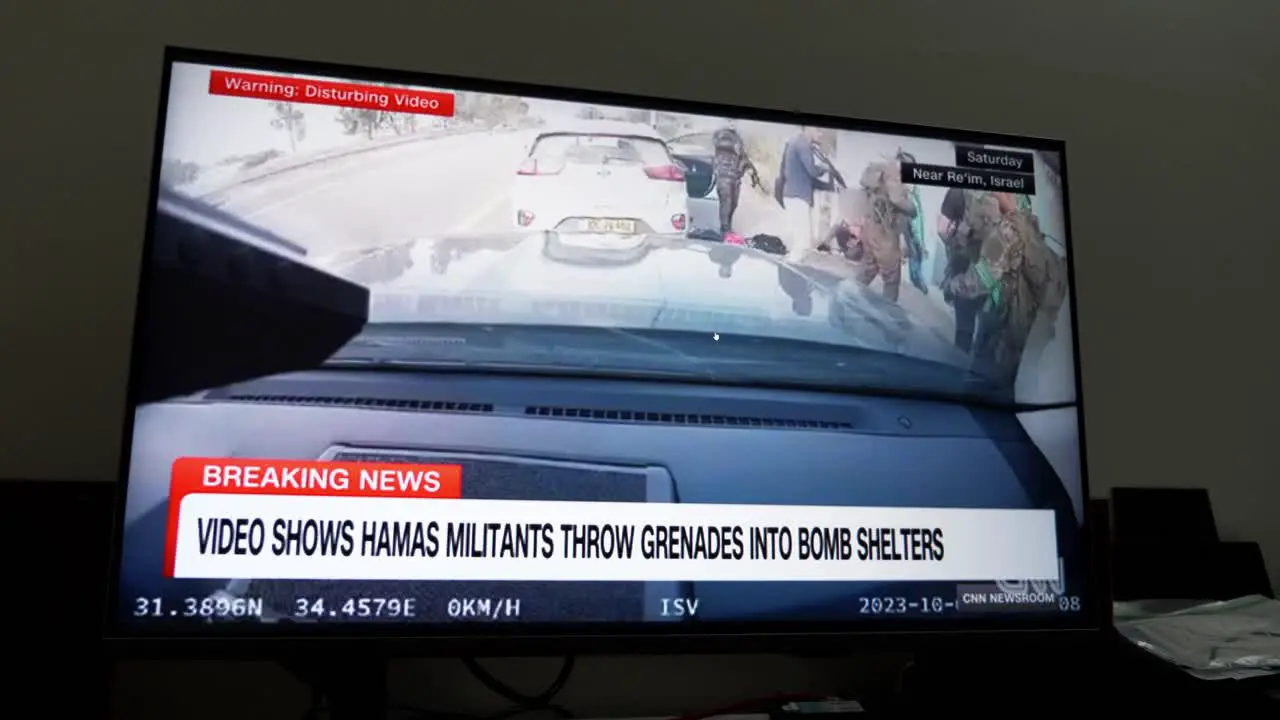 Watching the CNN breaking news a live telecast on the attack on Israel by the Hamas militant group on October 7 2023 which killed hundreds of people