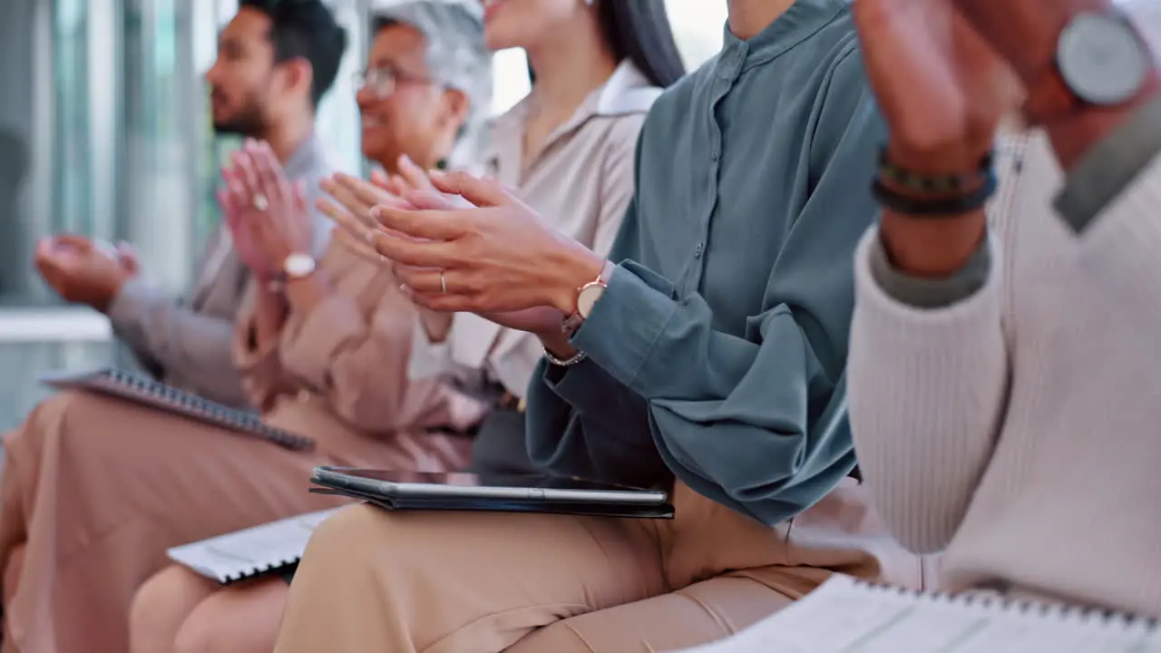 Clapping audience and business people in seminar