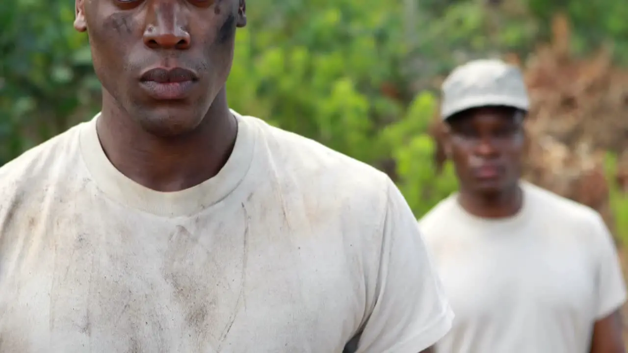 Fit men standing at boot camp