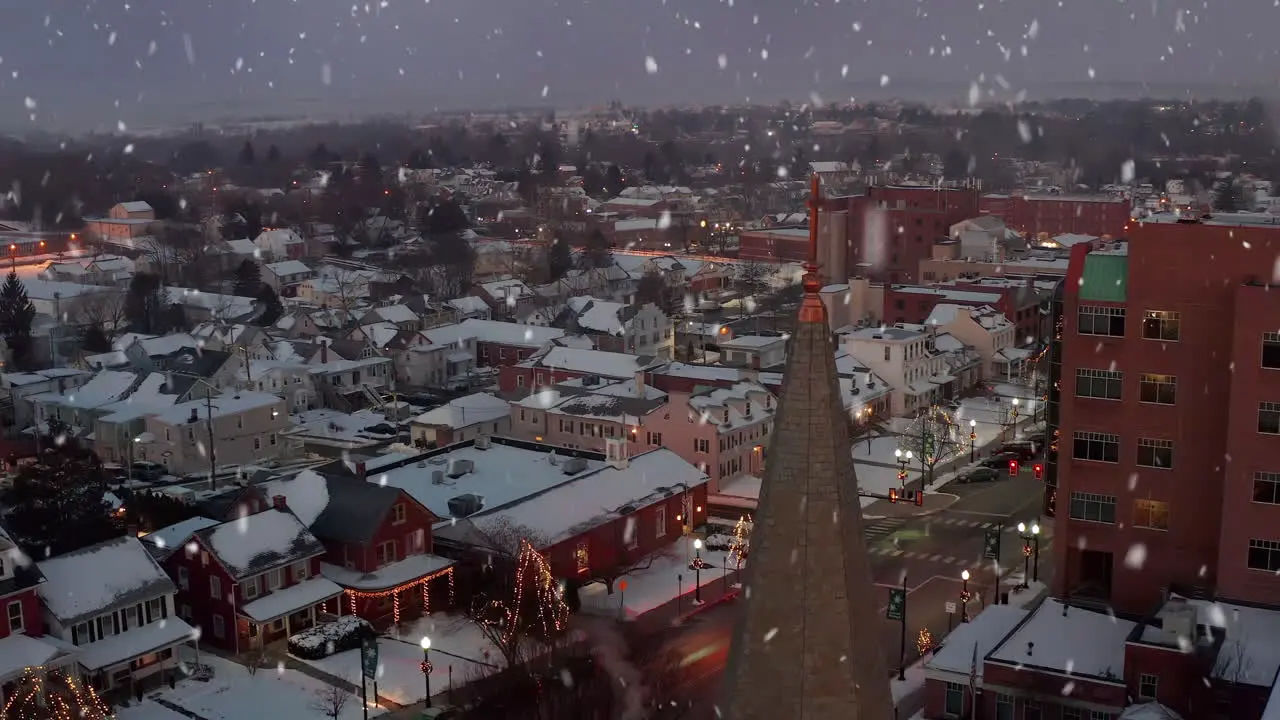 Snow falls at night during winter snow storm