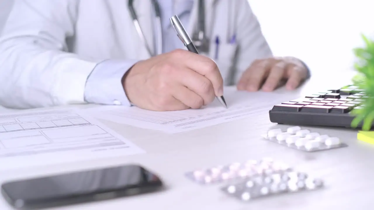 Close-up shot of the doctor is giving prescription diet Healthy eating concept