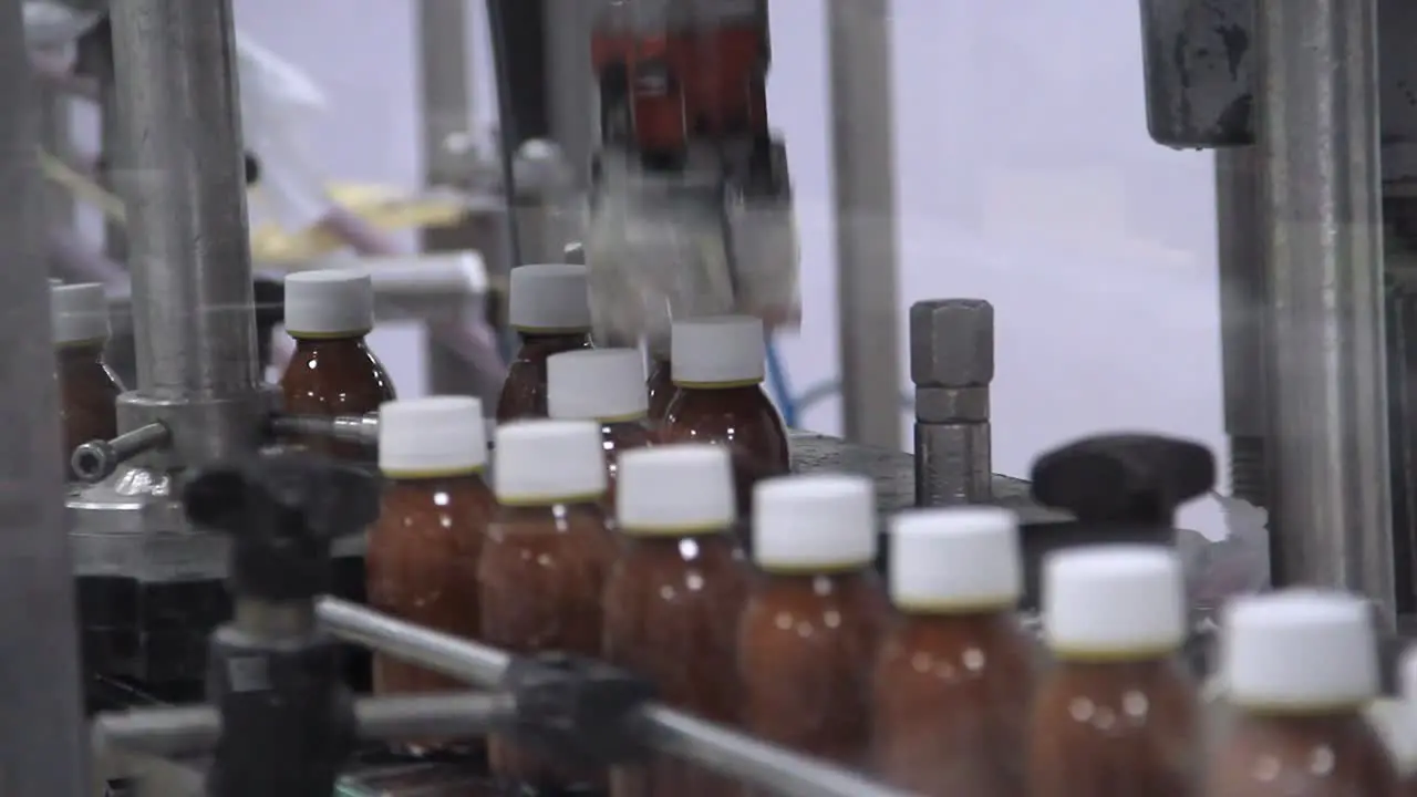 view of drugs move along conveyor belt in