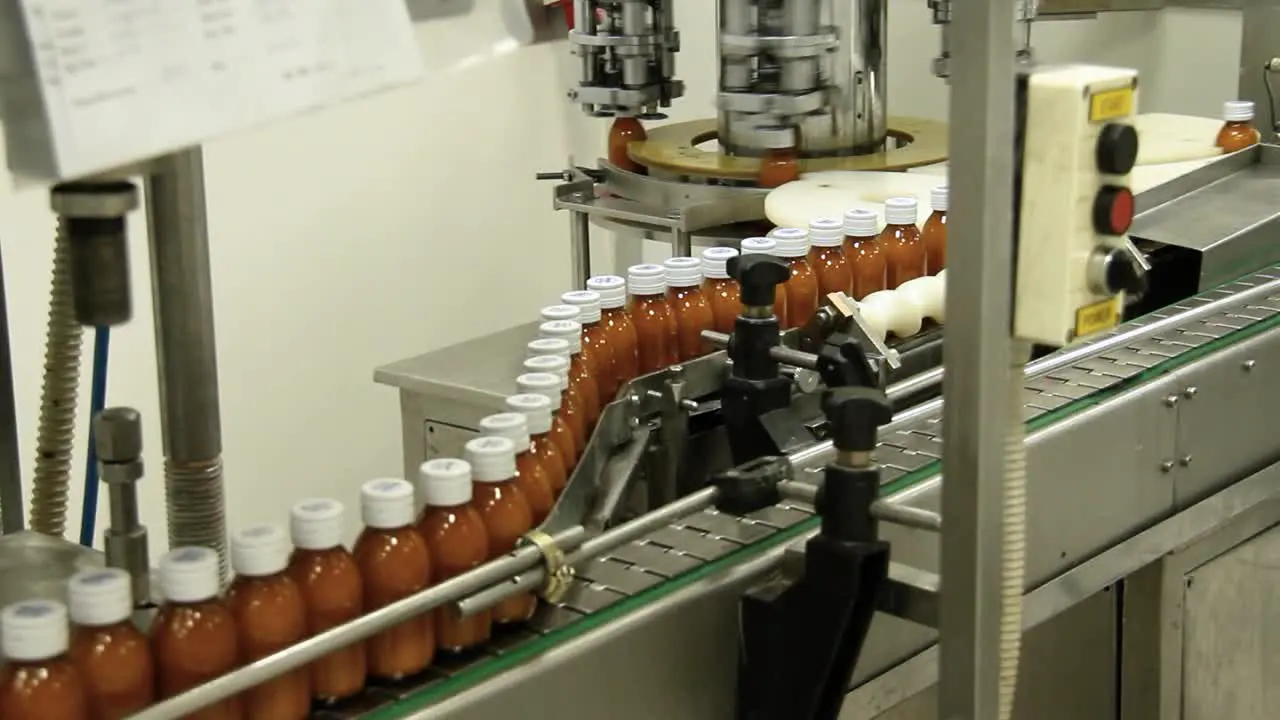 view of drugs move along conveyor belt during