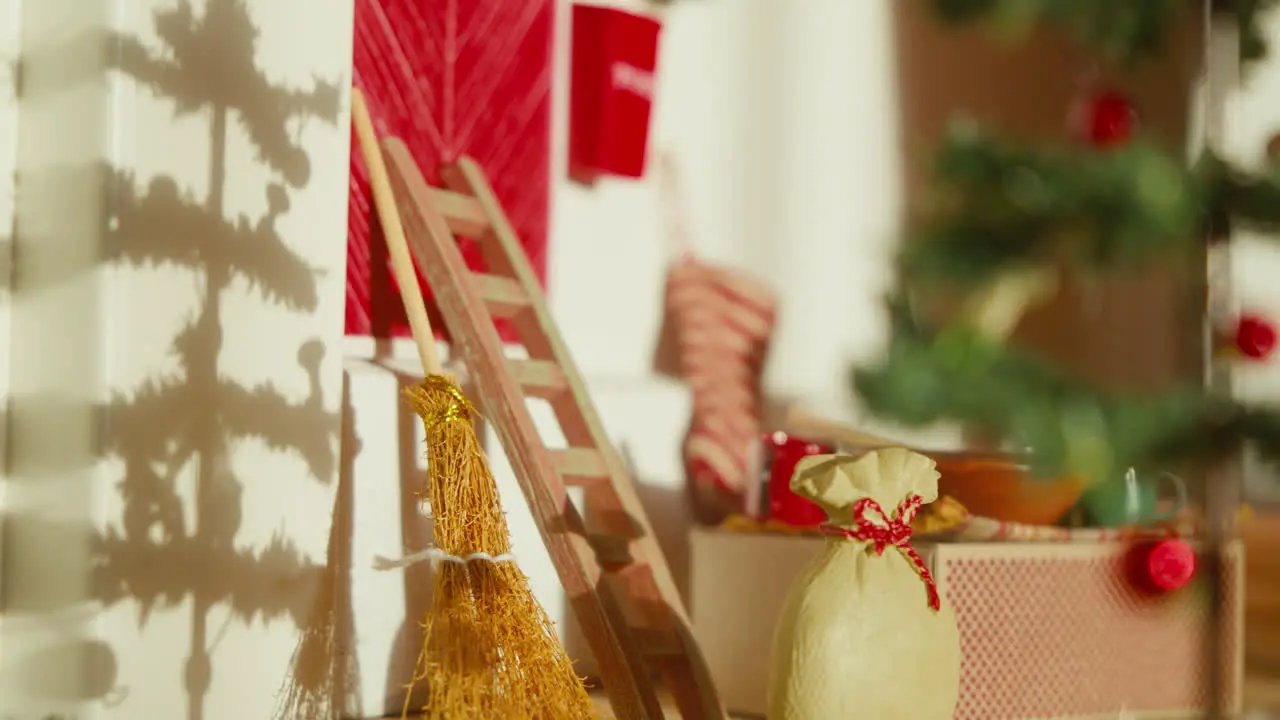 Festive shadow play by a Scandinavian elf door with holiday gifts