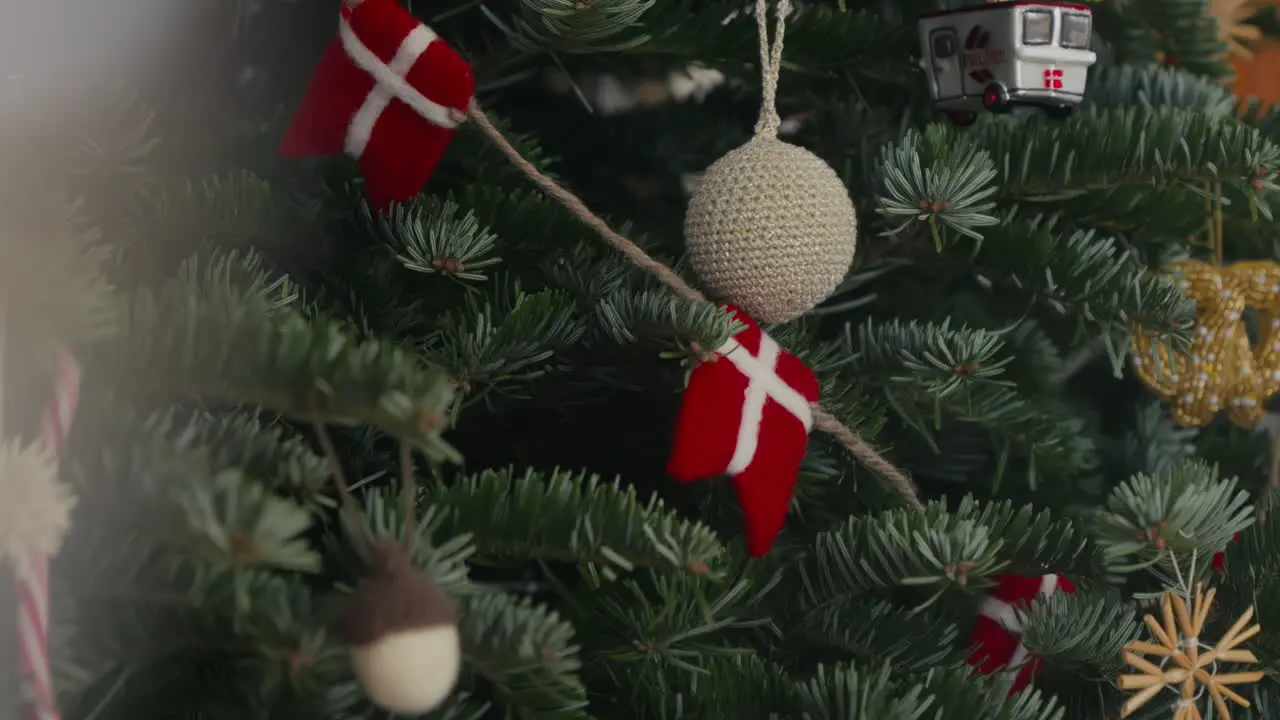 Danish-themed Christmas tree with traditional red and white ornaments