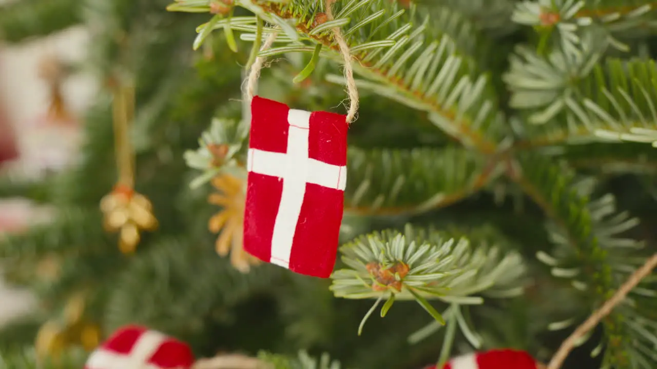 Handmade Danish flag ornament on a Christmas tree