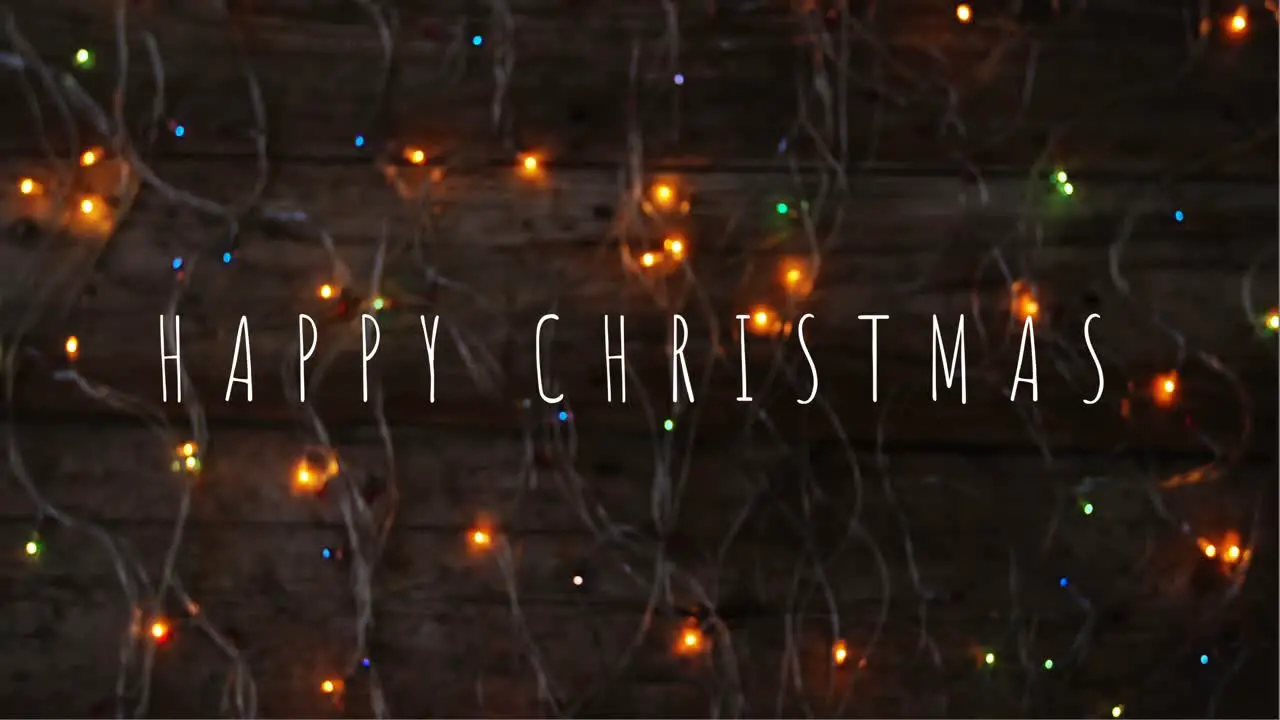 Merry Christmas text and fairy lights 4k