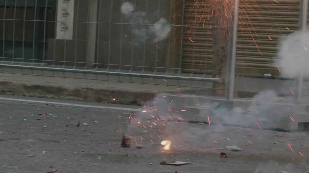 Firecracker bursting in the street Las Fallas celebration Spain