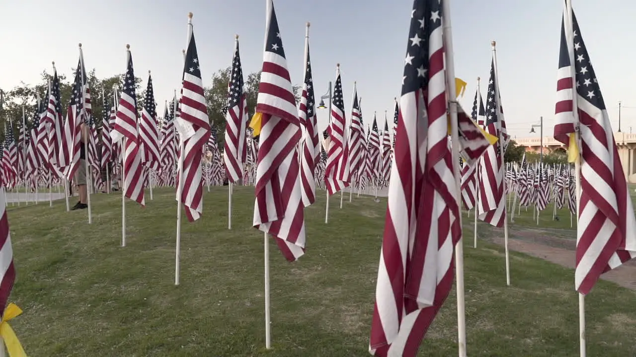 Slow Motion Nine Eleven Celebration of Fallen Soldiers with Many Flags