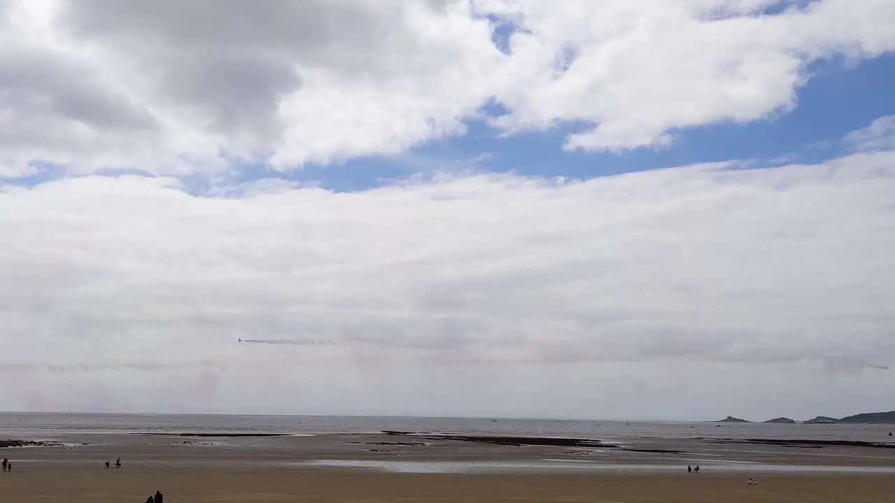 2 Red Arrows Planes Crossing Each Other Over Swansea Bay During Air Show