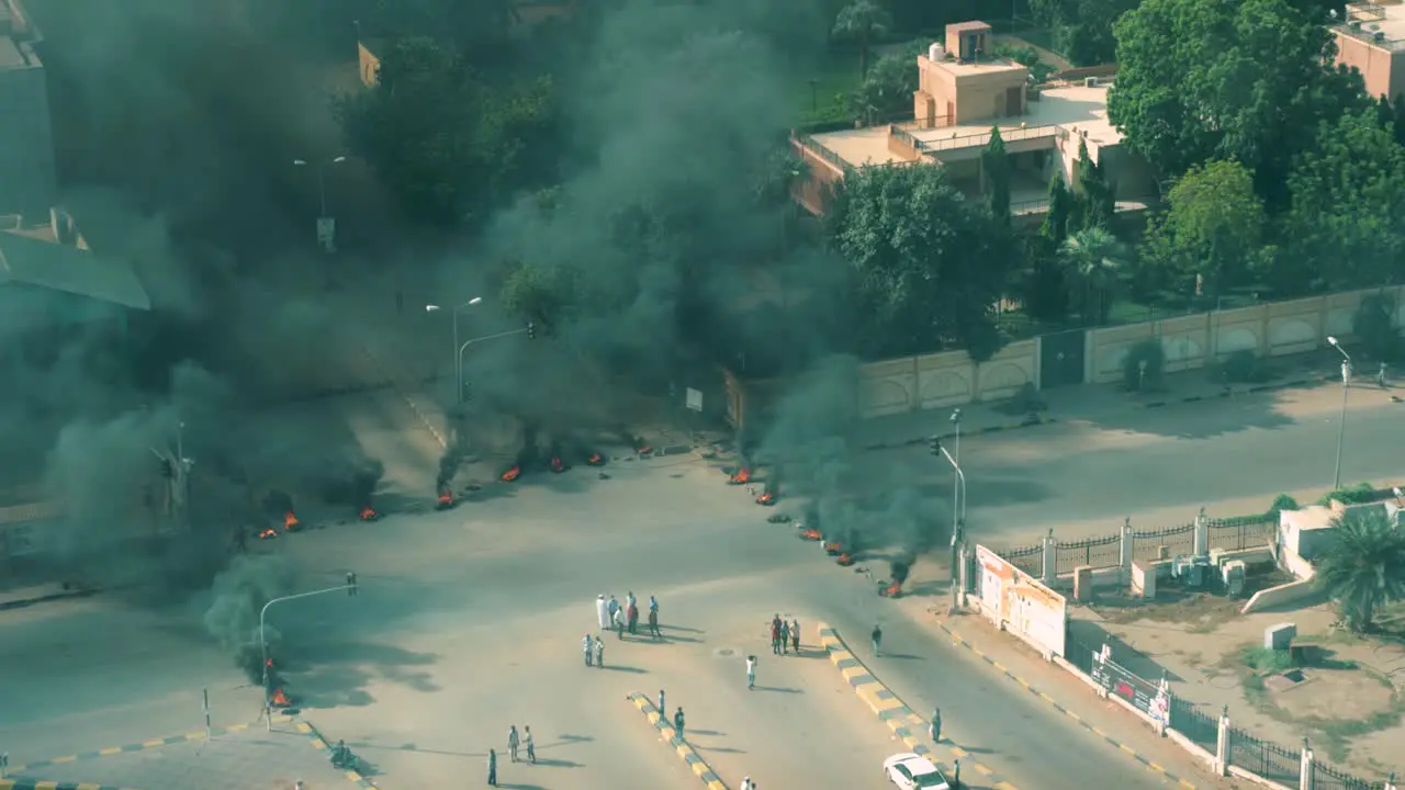 In the early morning hours and just after a military coup in Khartoum Sudan civilian activists burn tires and set up roadblocks in protest