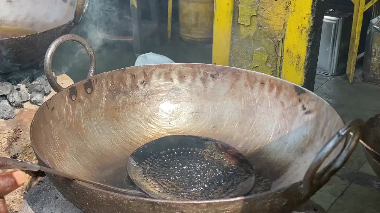 High angle shot over luchis or Indian Poori which is a deep fried bread made from flour in an roadside stall in India