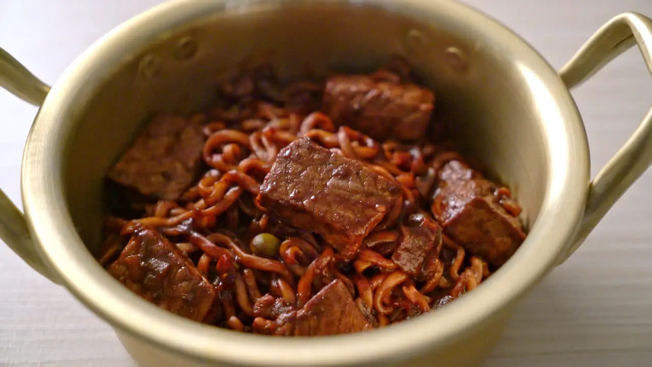 Jjapaguri or Chapaguri Korean Black Beans Spicy Noodles with Beef Korean food style