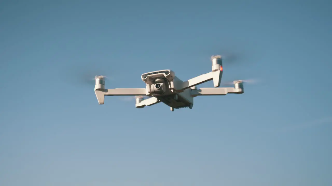 White Drone Flying on Nature Background