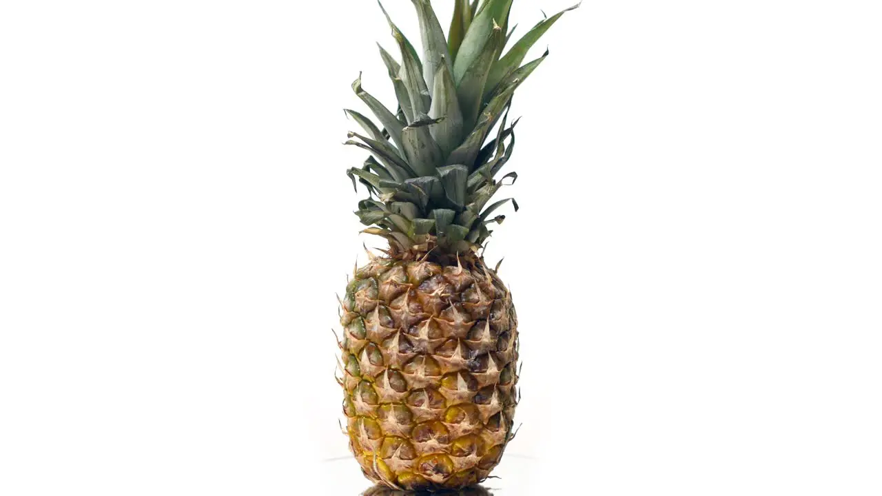 Pineapple rotating on a white background