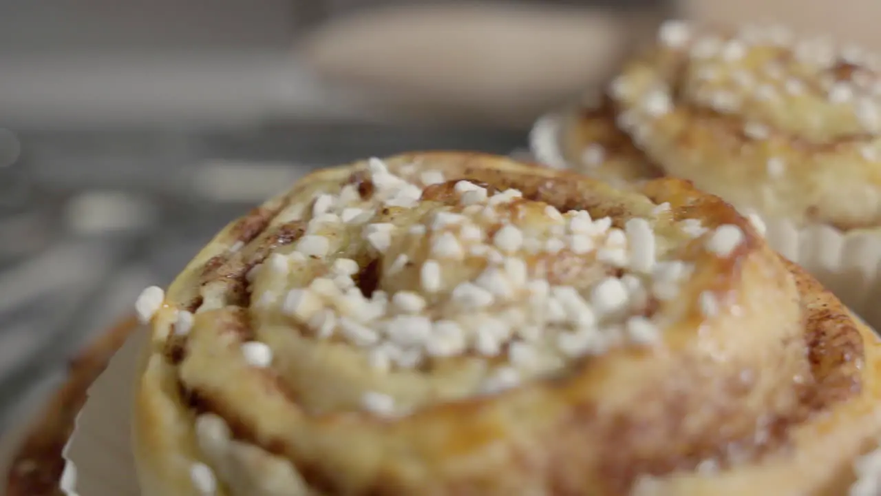 Close up slide of a pile of cinnamon buns