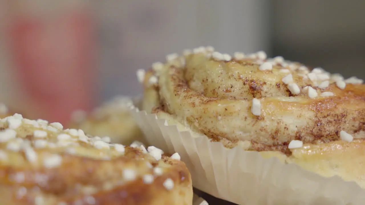 Close up shots of a pile of cinnamon buns