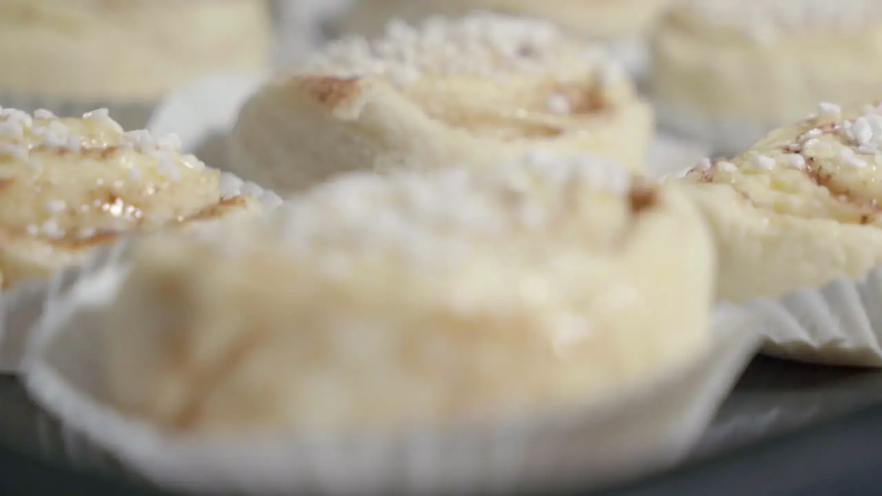 Extreme close up slide of unbaked cinnamon buns