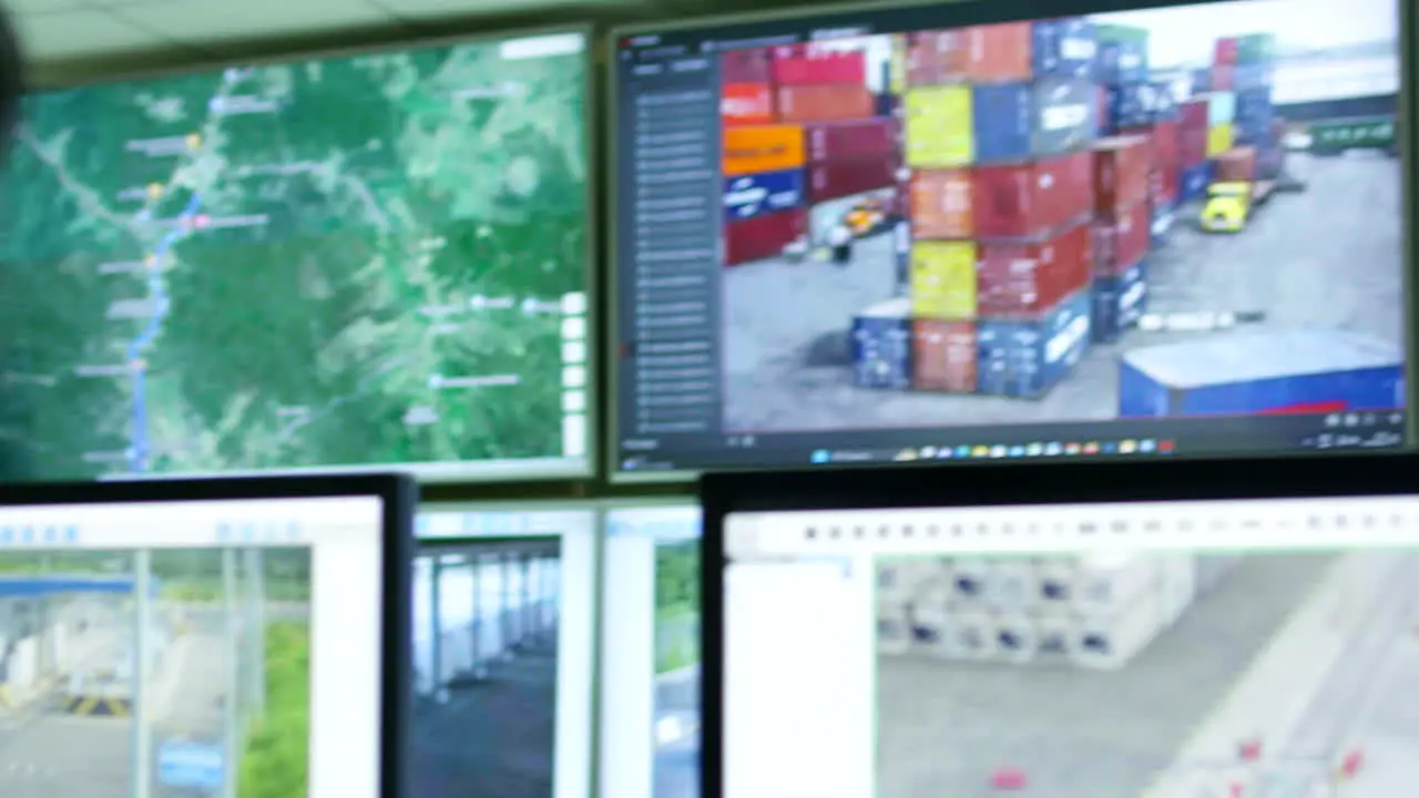 shot of male security guard in surveillance room customs