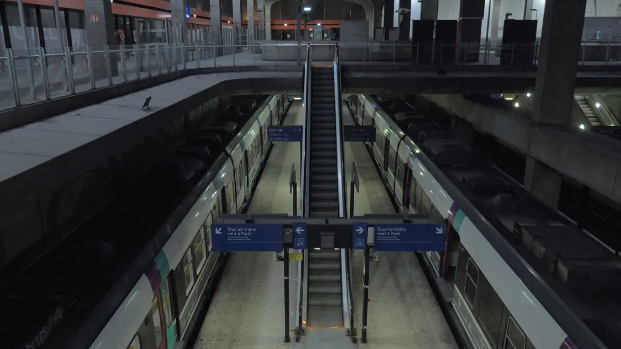 Empty subway station and moving escalator in Paris France